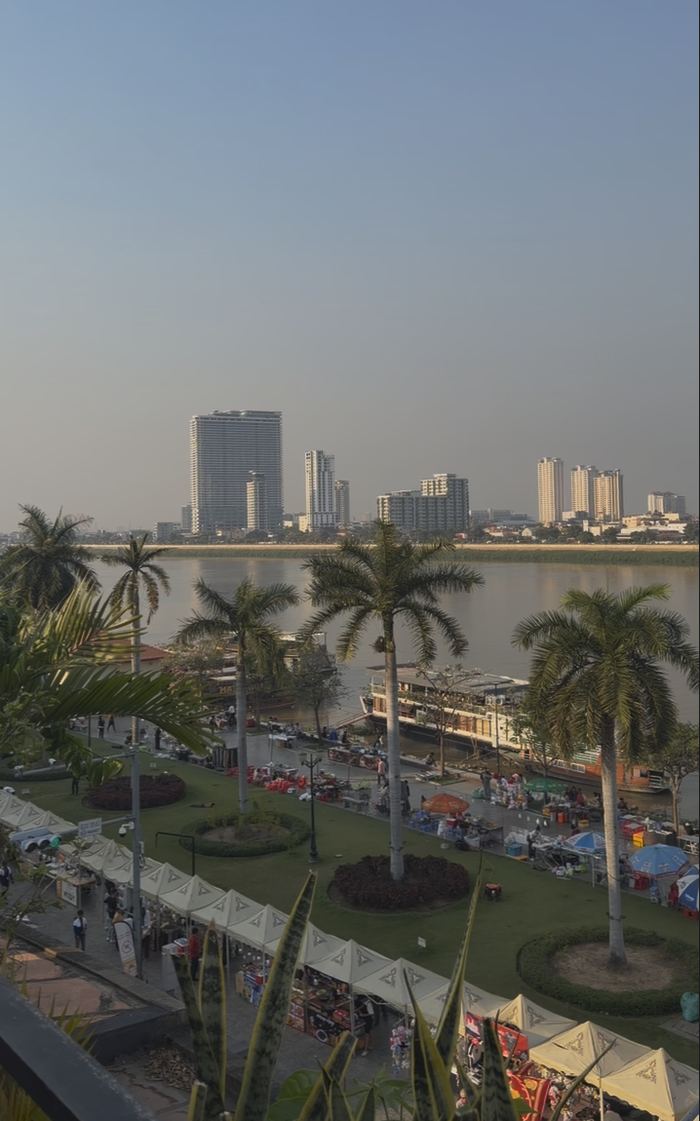 Looking down on the Phnom Penh riverfront with the skyline behind