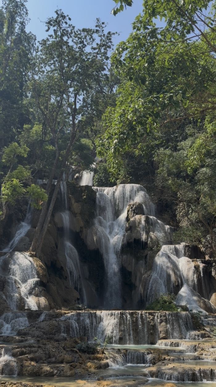 The main waterfall at Kuang Si cascading over limestone