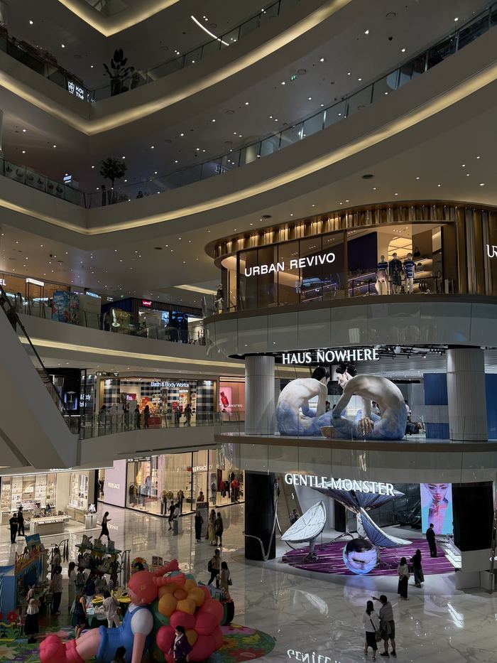 A multi-level atrium inside a modern mall