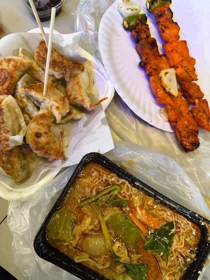 Crocodile skewers, tom yum, and gyoza