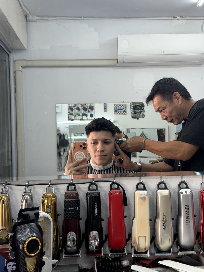 Getting a haircut at a barbershop