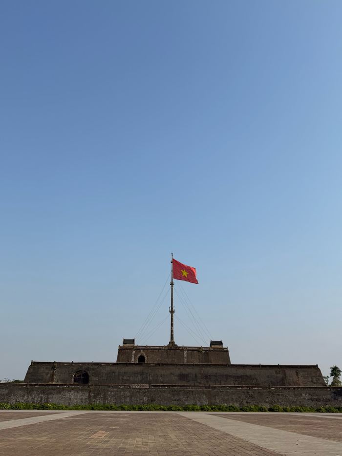 The Flag Tower of the Hue Citadel under a clear sky